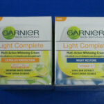 Set of GARNIER Light Complete Multi Action Whitening Day cream and Night cream