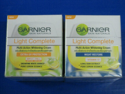 Set of GARNIER Light Complete Multi Action Whitening Day cream and Night cream